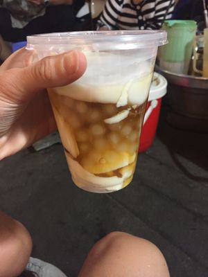 Hot tofu with glutinous riceballs, ginger syrup and coconut milk at Hot Tofu - Food Stand in Ho Chi Minh City