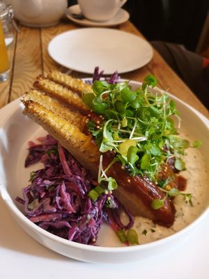 Smoked rib of corn with sticky bourbon glaze, a red cabbage slaw, a beautiful creamy ranch dressing, topped with watercress at The Roundhill in Brighton