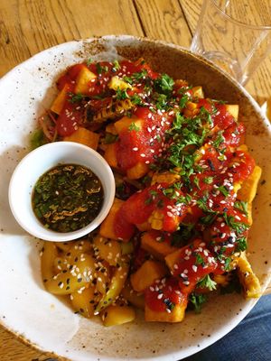 Chickpea tofu salad with light fluffy chilli chickpea tofu pieces, with charred corn on a gorgeous salad at The Roundhill in Brighton