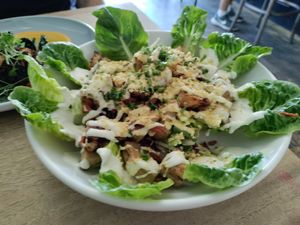 Chikin Caesar salad with added facon at The Roundhill in Brighton