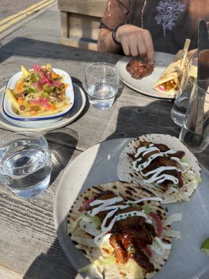 Jerk wraps, cheeseburger fries and bhaji naan  at The Roundhill in Brighton