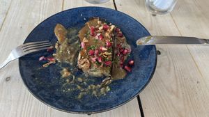 Smoked garlic miso aubergine small plate, part eaten  at The Roundhill in Brighton