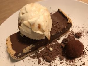 Amazing chocolate date tart with peanut salted caramel ice Cream! at The Roundhill in Brighton