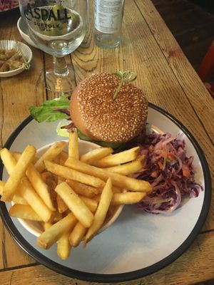 BBQ seitan burger with fries and coleslaw   at The Roundhill in Brighton
