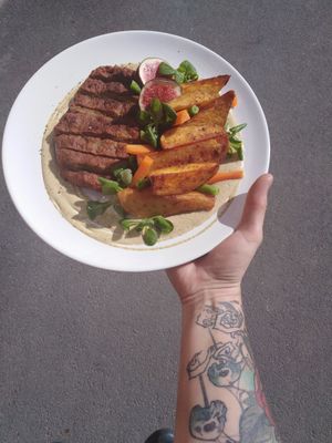 Seitan steak & baked potatoes, mustard tarragon sauce. at Bubu's Pub & Kitchen in Prague