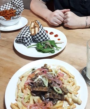 Tofu Wrap, Poutine and Sweet Potato Fries at Bubu's Pub & Kitchen in Prague