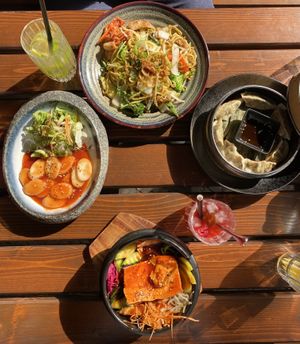 Mandu (right), Rice Cake (left), Bibimbap (bottom) and Wok Ramen Noodles (top) at Feel Seoul Good in Berlin