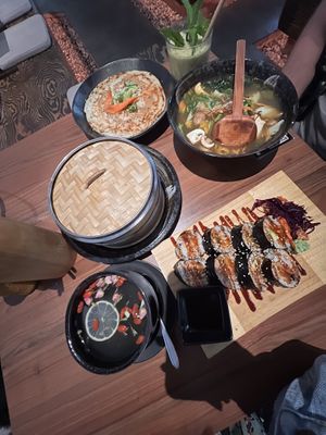 japchae, pancake, rosebud tea, kimbap and mandu inside the bowl  at Feel Seoul Good in Berlin