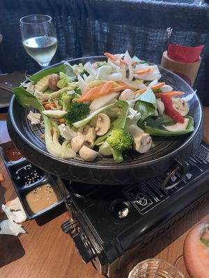 Bapsang BBQ for two people: Stage 1 – add the vegetables  at Feel Seoul Good in Berlin