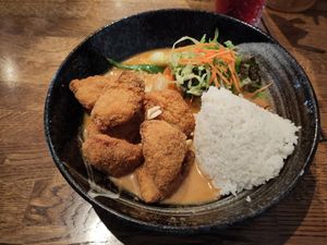 Vegan chicken with veggies and rice in a peanut sauce at Feel Seoul Good in Berlin