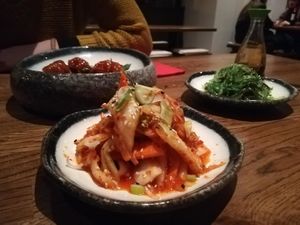 Kimchi (homemade), seaweed salad, and Ketchup crunch at Feel Seoul Good in Berlin