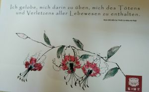 A beautiful postcard we got! "I vow to excercise myself in abstaining from causing death or harm to any living being" at Feel Seoul Good in Berlin