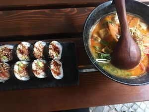 Noodle soup with coconut milk and tofu and rice rolls   at Feel Seoul Good in Berlin