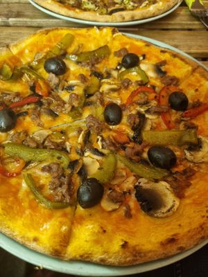 Vegan mozzarella, Beyond Meat, mushrooms, peppers and olives. Very good! at Happiz - Monge in Paris