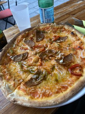 Vegan salami and vegan Morzarella pizza   at Happiz - Monge in Paris