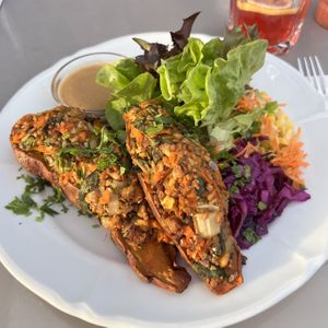 sweet potato with smoked tofu & seeds filling, salad and tamarind dip  at Hirscheneck in Basel