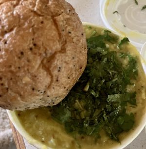 This is the Kitcheree w their yummy roll on the side. Absolute comfort food.   at Dharma's in Capitola