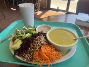 Gardener’s Salad, Lemon Tahini Dressing, Malaysian Corn Chowder, and Raspberry Shake  at Dharma's in Capitola