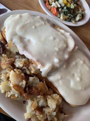 Sourdough and gravy with homedfries  at Panchos & Gringos Deli in San Antonio