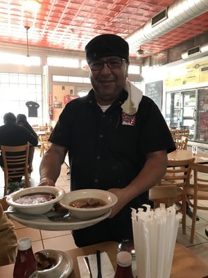 Sergio, the owner, serving some nice tastes at Panchos & Gringos Deli in San Antonio
