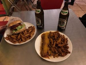 Vegan curry wurst and a burger.  at Yoyo Foodworld in Berlin