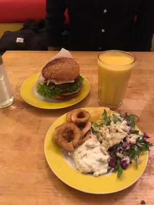 Burger and Calamari rings with a Mango milkshake at Yoyo Foodworld in Berlin