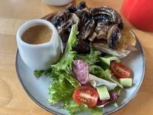Mushrooms on sourdough with oat cream garlic saucee made  at Spider on a Bicycle in Aboyne