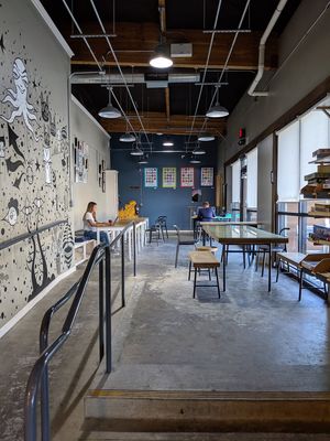 Right hand side of the shop. They have board games available.  Great place for studying or gatherings. at SloDoCo in San Luis Obispo