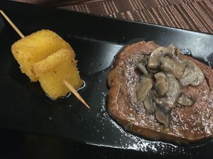 Seitan with mushroom and polenta at GingerGi in Padua