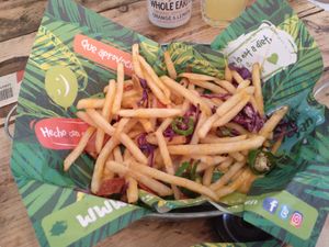 Patatas veganísimas con “queso” cheddar. at The Began in Valencia