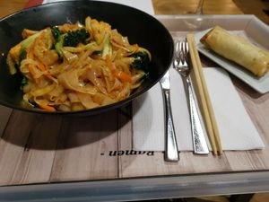 Vegan rice noodles with veggies and tofu. And a veggie springroll at Sugoi Ramen in Bilbao