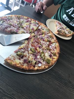 Vegan marinara, jalapeño, pineapple and red onion pizza at Pizza Twist in Clovis