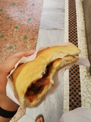 Filled with onion tomato and olive at Panzerotti Luini in Milan