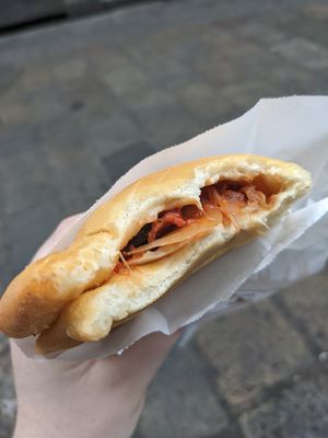 Onion, tomato and olive panzerotti at Panzerotti Luini in Milan