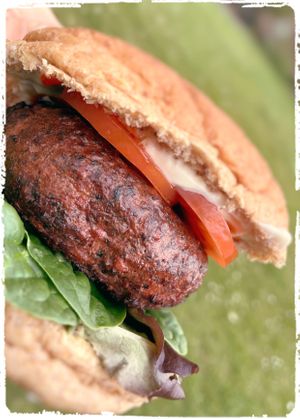 Beetroot burger with leaf guacamole vegan sriracha Mayo. Also available as sweet potato.  at Matthews Hall Cafe in Topsham