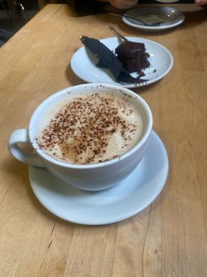Vegan brownie and cappuccino   at Matthews Hall Cafe in Topsham