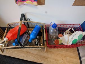 Spare bottles and jars left by others so customers can use for free at Ripple Living in Cardiff