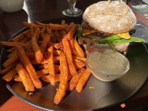 Tempeh burger with cheddar and sweet potato fries  at Focus Foodbar in Tilburg
