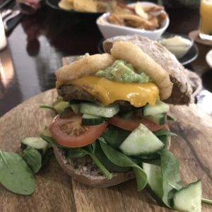 Home made burger with fried onion rings 🤘🏽 at Focus Foodbar in Tilburg