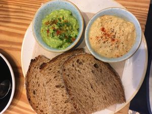 Sourdough bread with guacamole and houmous at Hinterland in Brussels