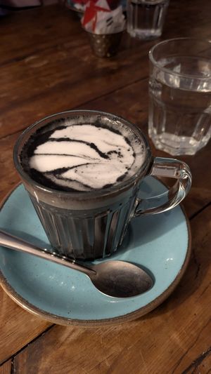 Oat milk charcoal latte at The Canteen in Nailsworth