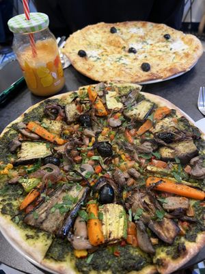 vegan pizza and cheese pizza  at Veggie Pause  in Fes
