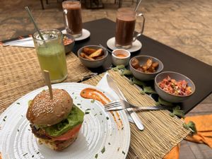Hot chocolates with coconut milk, lemon mint juice, Giulia burger  at Veggie Pause  in Fes