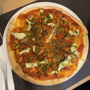 Vegan pizza - they don’t have vegan cheese but lots of other good toppings, still delicious at Veggie Pause  in Fes