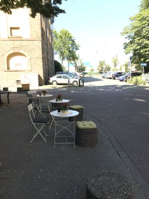 Sitting outside  at Mahalo Poke Corner in Mannheim