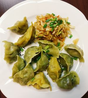 Vegan dumplings with shiitake and veggies in spinach dough. at Meimei in Rzeszow