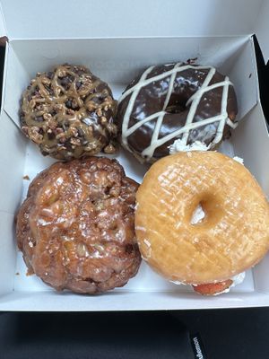 Clockwise from top left: Caramel on parade, x-ray speculoos, strawberrylab, fritter seems forever  at Donut Friend - DTLA in Los Angeles
