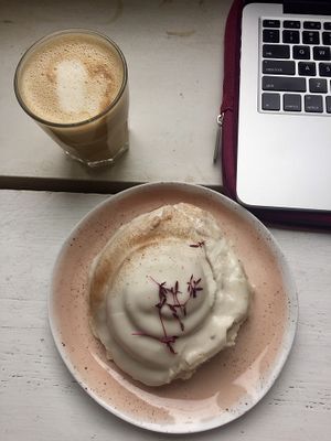 Cinnamon roll and a peanut butter coffee at WAVE in East London