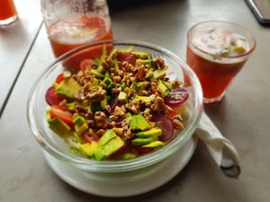 Avocado salad with strawberry lemonade at Caffe Miasto in Warsaw