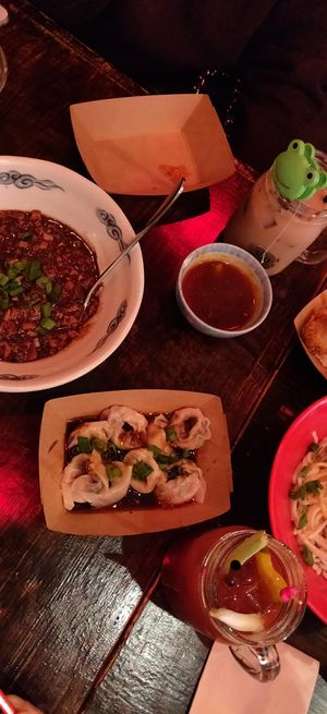 Wontons, dan dan noods, bloody Mary, zia jiang mian at Spicy Moon - 6th St in New York City